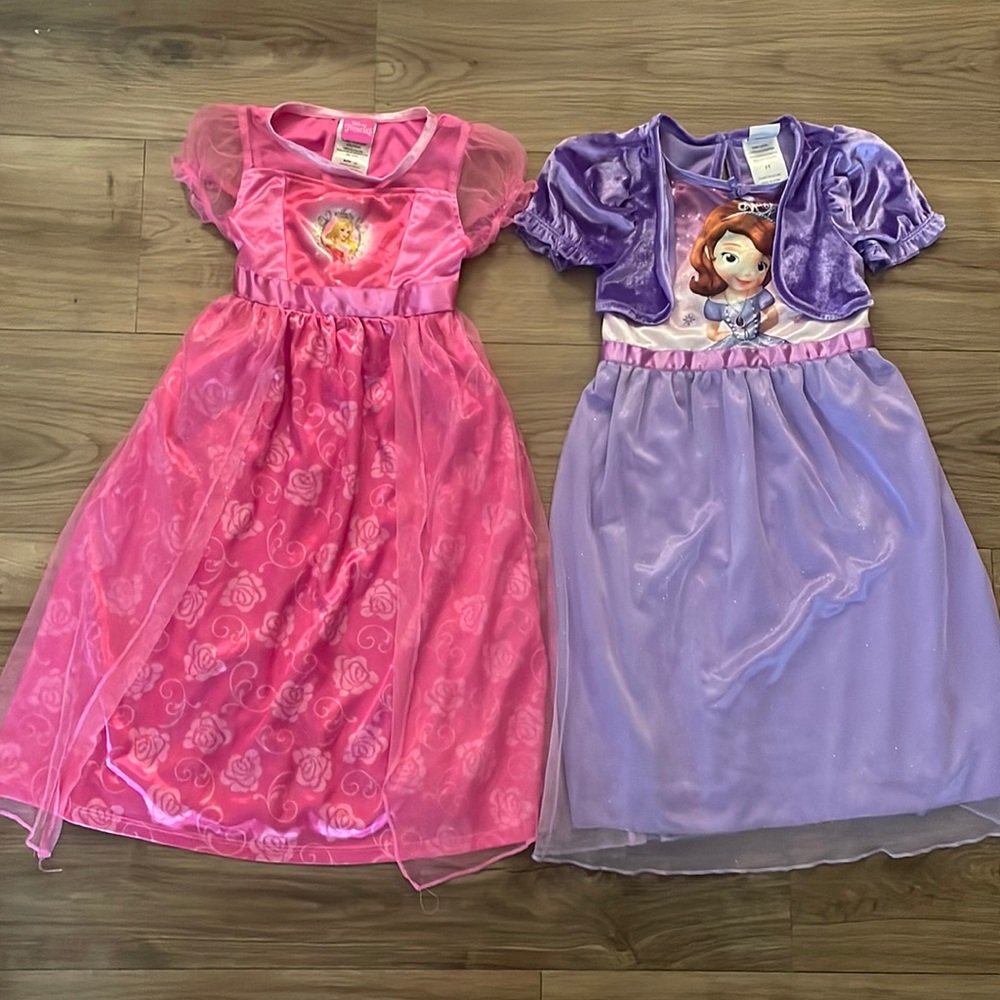 2 Disney Princess Nightgowns. Purple is Size 3T. Pink is Size 4T.